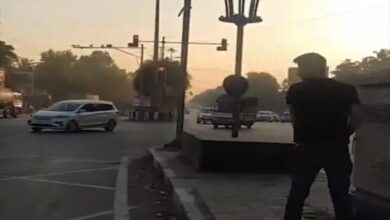 A young man riding a BMW urinated on the road