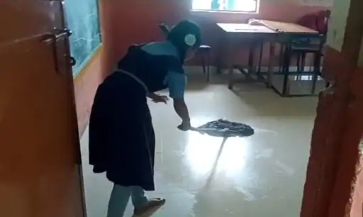 Children in school are leaving their studies and cleaning the floor