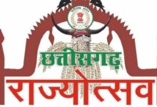 अ