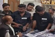 An NSUI leader attempted to garland the principal with shoes; police are searching for him.