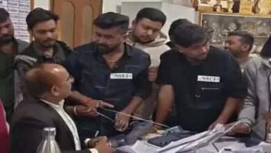 An NSUI leader attempted to garland the principal with shoes; police are searching for him.