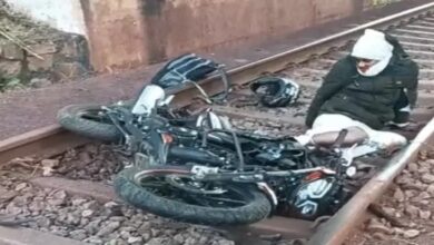 A motorcyclist fell 40 feet from a bridge onto the train tracks; the loco pilot applied the emergency brakes and saved his life.