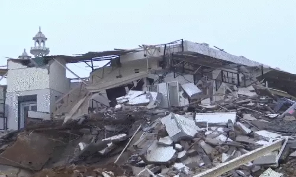 Police and MCD team pelted with stones during encroachment removal operation at a mosque and cemetery in Delhi.