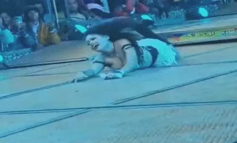 A woman danced after taking off her clothes, and the SDM showered her with money.