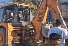 Bulldozers were used to remove encroachments at the Sunday market.