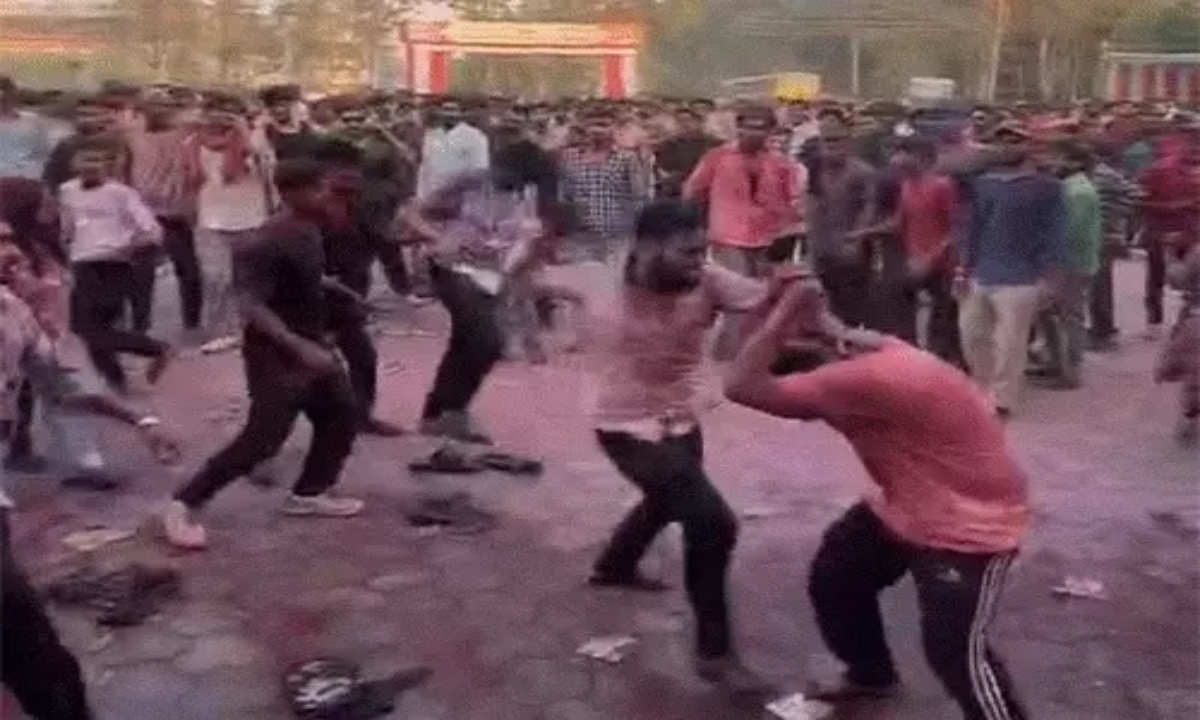 Students exchange blows during Holi celebrations