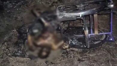 Differently-abled teacher's throat slit; body burned along with tricycle.