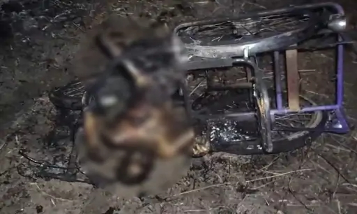 Differently-abled teacher's throat slit; body burned along with tricycle.