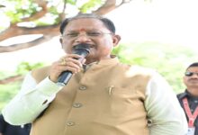 Chief Minister's *Chaupal* under the shade of a mango tree: Listened to villagers while seated on a *khaat* (cot); announced a nursing college and a mini-stadium.