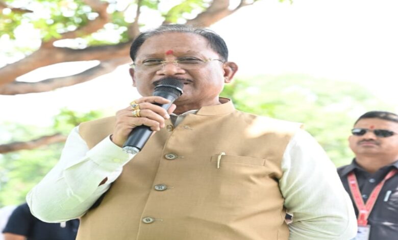 Chief Minister's *Chaupal* under the shade of a mango tree: Listened to villagers while seated on a *khaat* (cot); announced a nursing college and a mini-stadium.