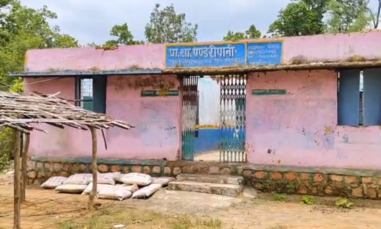 School building incomplete for a year; children forced to study under a thatched roof.