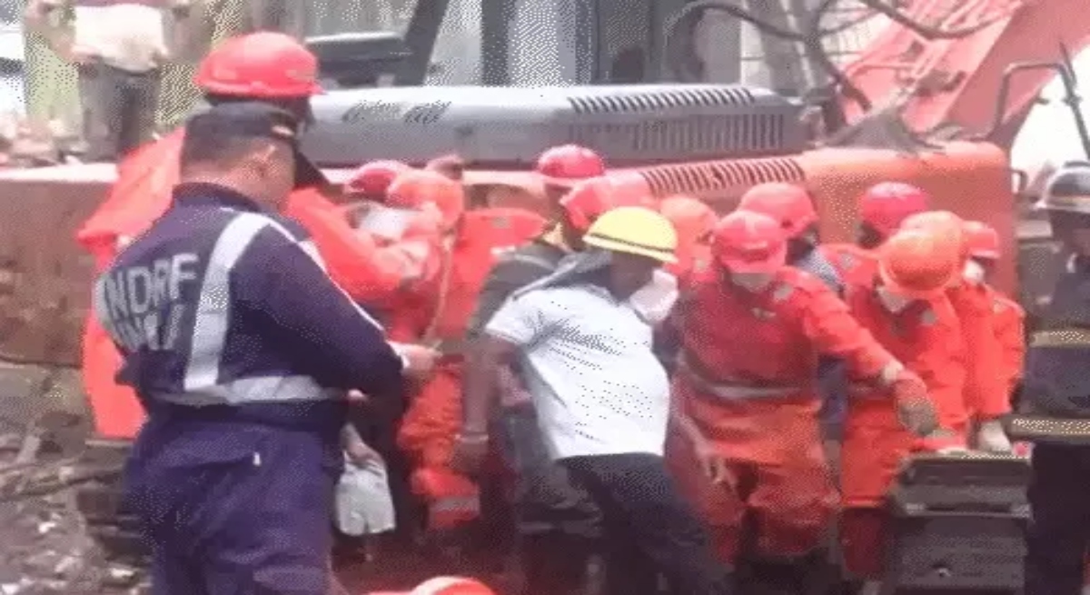 Four-storey building collapses: 9 dead, search for those trapped in debris underway; building had been declared dangerous.