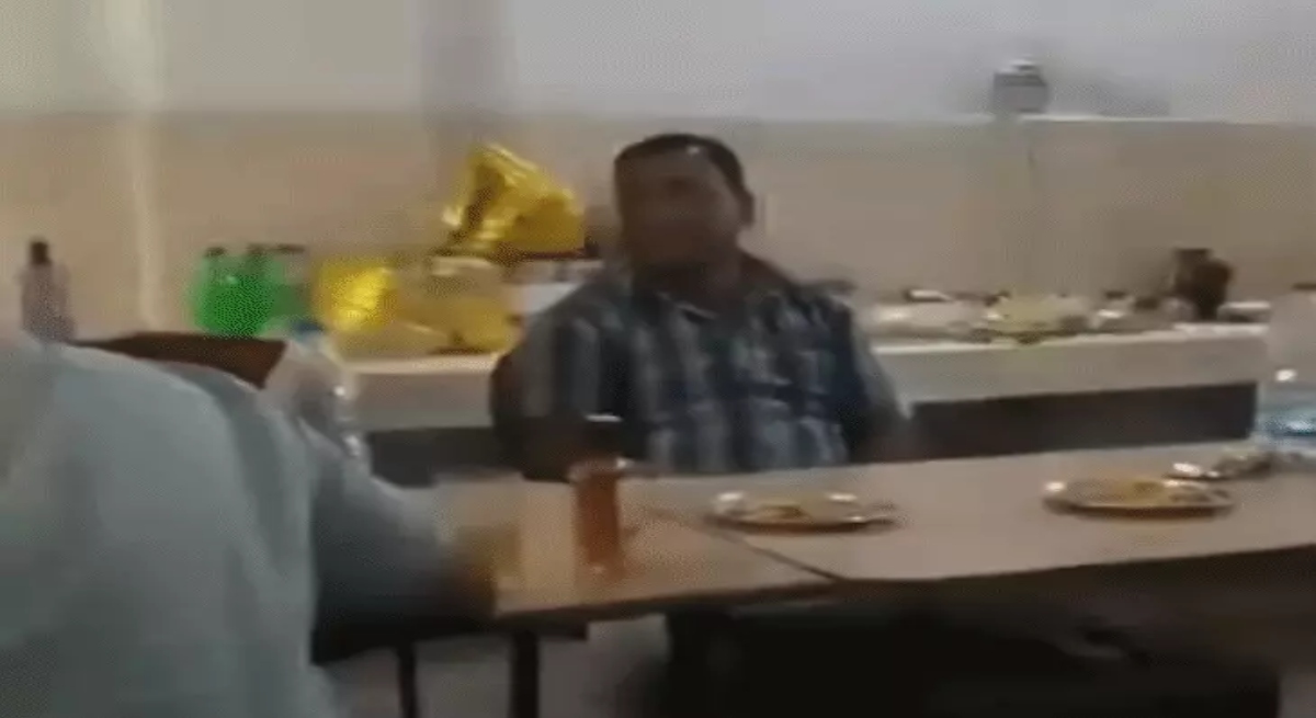 Government school turns into party spot: Video of teacher and cleaner with alcohol and chicken goes viral.
