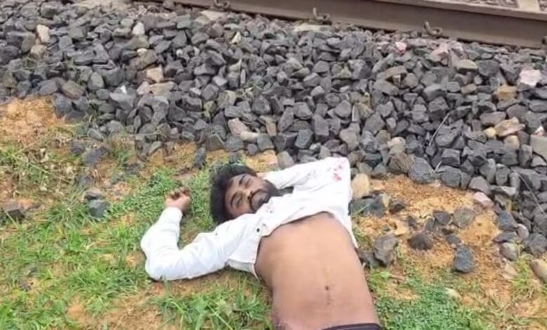 Young man's body found on railway track in Surajpur; death suspected to be due to falling from a train; police investigating.