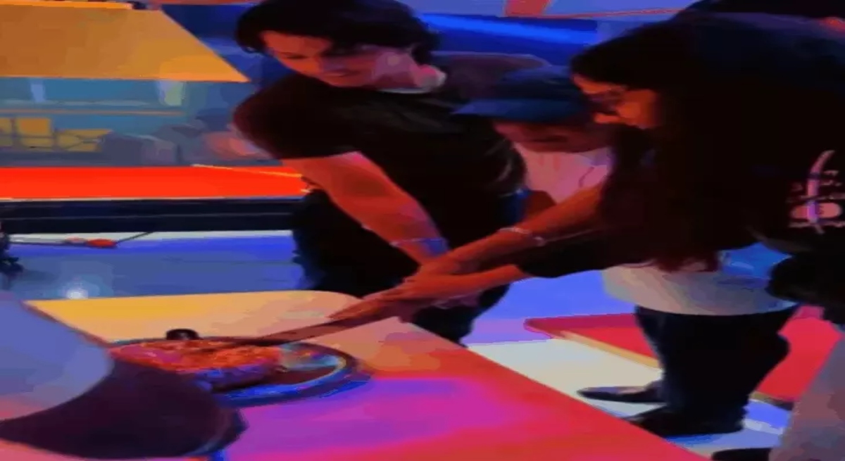 Shiv Sena chief cuts cake with a sword in Raipur.