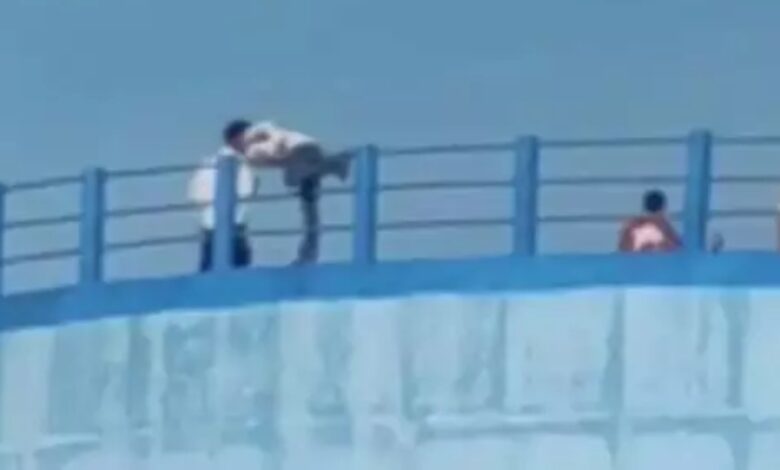 Life-threatening photoshoot on a 70-foot-high water tank.