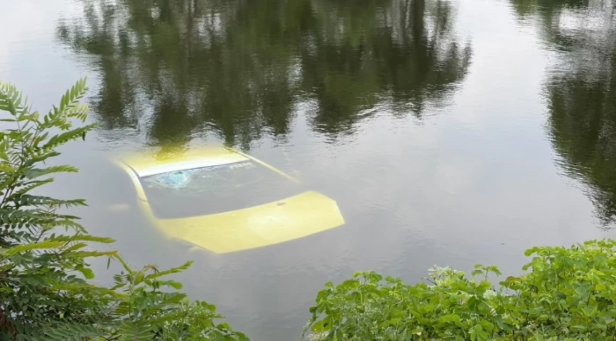 Minor pressed accelerator instead of brake; car plunged into pond.
