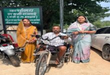 Minister Lakshmi Rajwade presented a tricycle to differently-abled Dhaneshwar, fulfilling her promise.