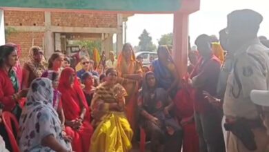 Minister Rajwade, incensed by action taken against villagers in Surajpur, reprimands the police.